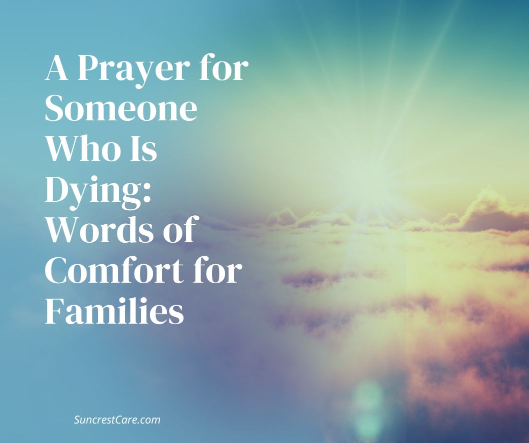 Family member praying quietly at the bedside of a loved one in hospice care